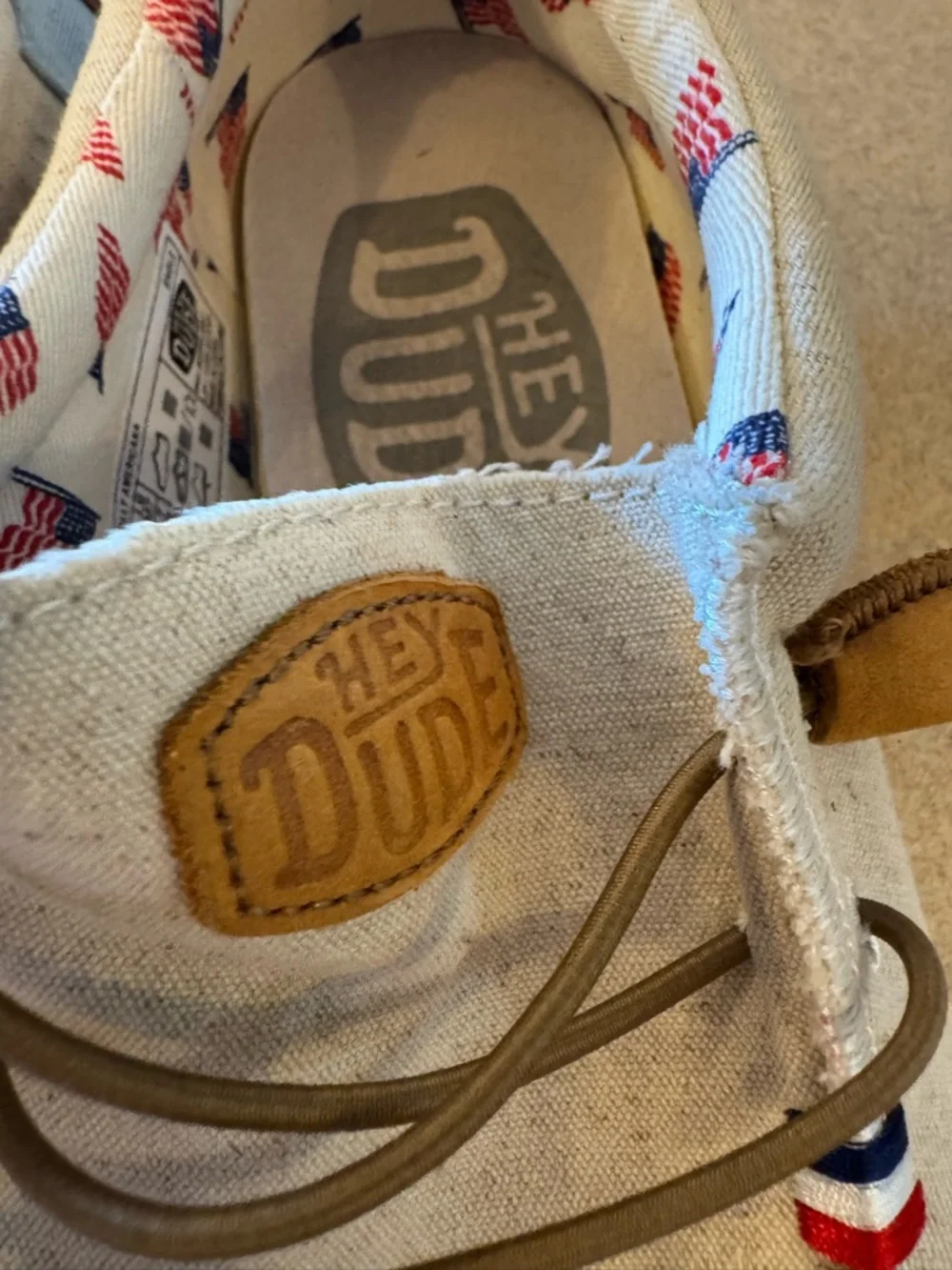 Hey Dude Cream Canvas Boat Shoes with Black Eagle Print